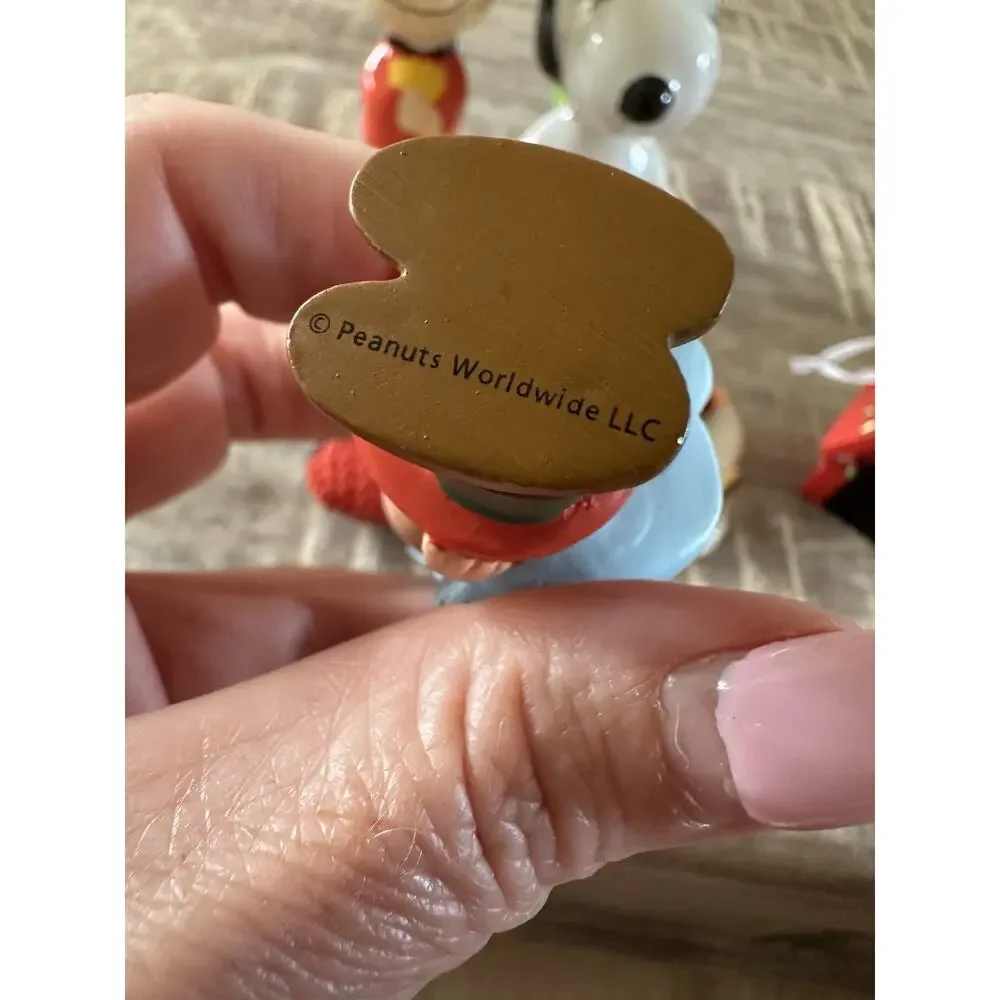 Lot 6 Hallmark Peanuts Worldwide Ornaments Snoopy Linus Etc